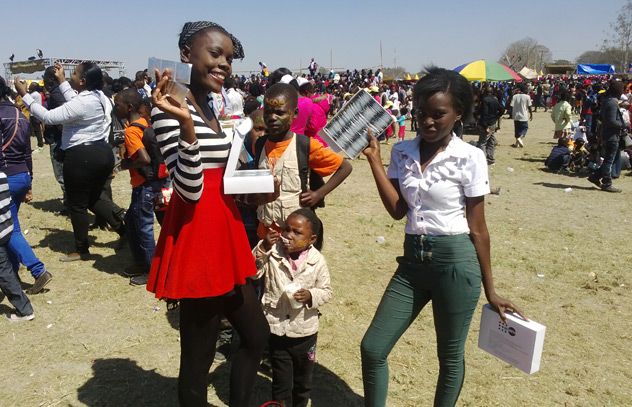 Young girls take free condoms. More than 120 000 condoms were distributed among young people at the 2014 Agricultural and Commercial Show of Zambia. Young girls take free condoms. More than 120 000 condoms were distributed among young people at the 2014 Agricultural and Commercial Show of Zambia.