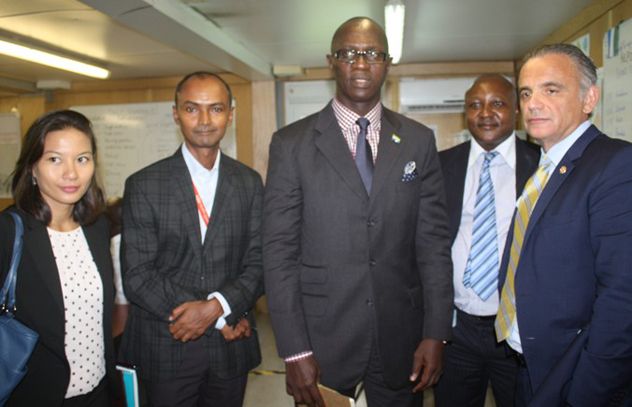 UNAIDS Staff with Major Paulo Conteh, Chief Executive Officer of Sierra Leone National Ebola Response Center UNAIDS Staff with Major Paulo Conteh, Chief Executive Officer of Sierra Leone National Ebola Response Center