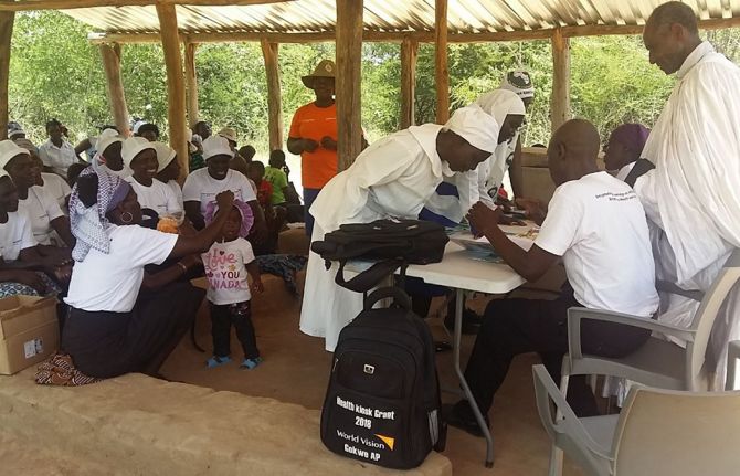 Mobile Health Kiosk session with Apostolic worshipers in Gokwe North district. Zimbabwe. Photo Credit: World Vision Health Kiosk staff Mobile Health Kiosk session with Apostolic worshipers in Gokwe North district. Zimbabwe. Photo Credit: World Vision Health Kiosk staff