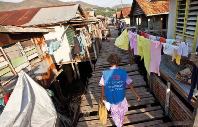 TB outreach to a floating neighborhood near Port Moresby, Papua New Guinea. Credit: John Rae Photography TB outreach to a floating neighborhood near Port Moresby, Papua New Guinea. Credit: John Rae Photography
