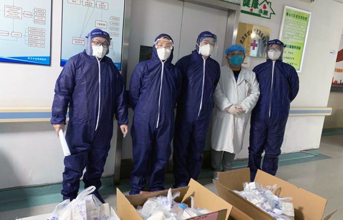 Members of the Wuhan LGBT Center pick up HIV medications from a hospital hub where COVID-19 is prevalent. Credit: UNAIDS Members of the Wuhan LGBT Center pick up HIV medications from a hospital hub where COVID-19 is prevalent. Credit: UNAIDS