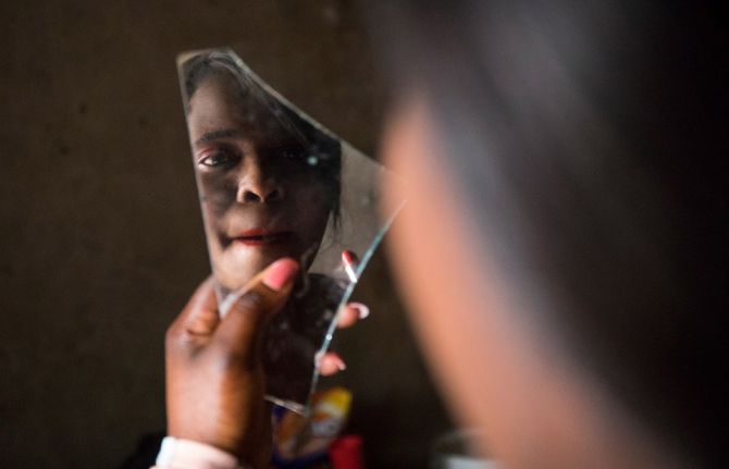 Melody, a sex worker from Epworth, Zimbabwe, prepares herself for work. Melody receives support from Katswe Sistahood, an organization which advocates for women’s full attainment of sexual and reproductive rights in Zimbabwe. Credit: UNAIDS/C. Matonhodze Melody, a sex worker from Epworth, Zimbabwe, prepares herself for work. Melody receives support from Katswe Sistahood, an organization which advocates for women’s full attainment of sexual and reproductive rights in Zimbabwe. Credit: UNAIDS/C. Matonhodze