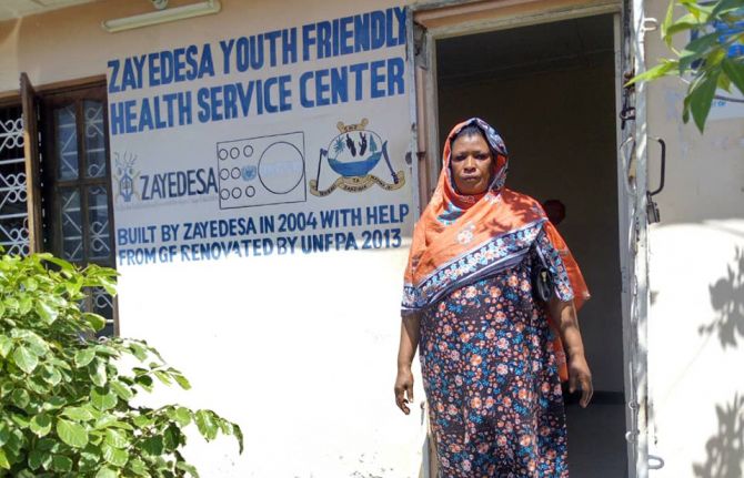 7 October, 2019 - Zanzibar, Tanzania - Teresia Francis (Teddy Francis John), peer educator, a former female sex worker walking in the streets of Zanzibar. Supplied to UNAIDS Photographer: ? 7 October, 2019 - Zanzibar, Tanzania - Teresia Francis (Teddy Francis John), peer educator, a former female sex worker walking in the streets of Zanzibar. Supplied to UNAIDS Photographer: ?